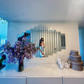 Your product, shot in front of the art deco mirror