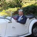 Your product, shot with a vintage white convertible car