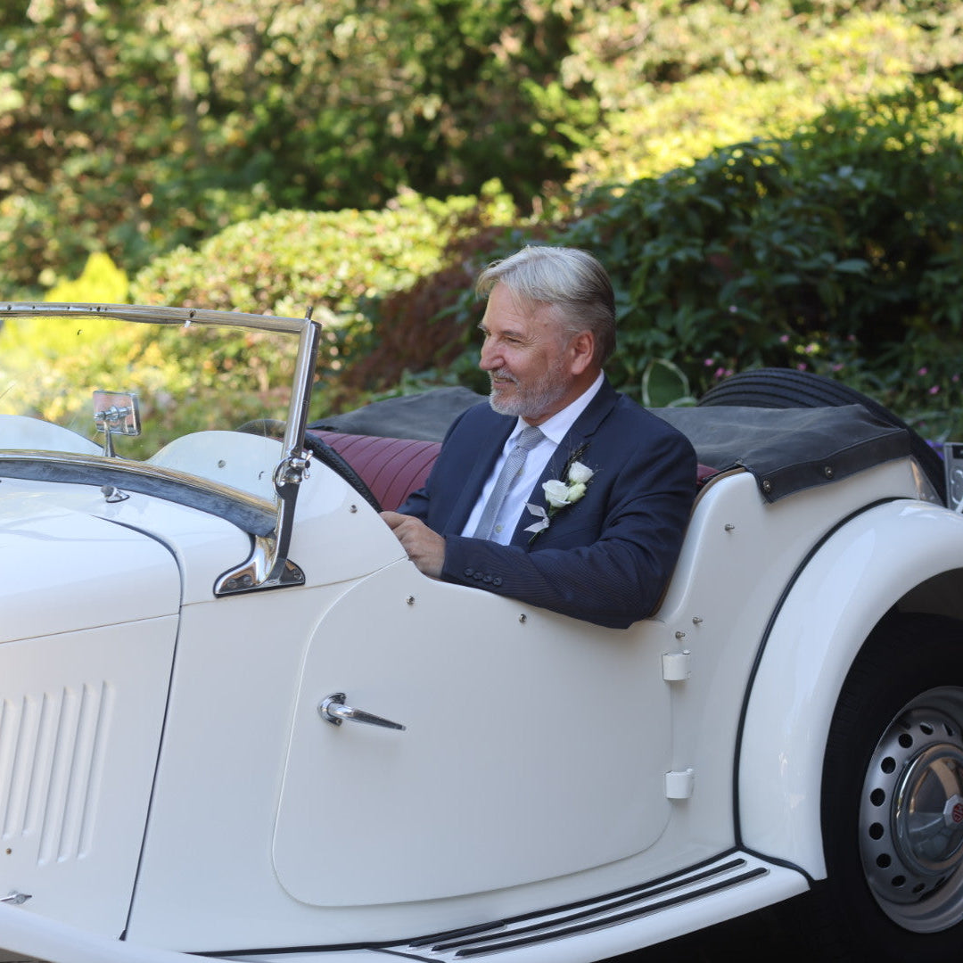 Your product, shot with a vintage white convertible car