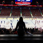 Evelyn Martin hosting the Budweiser corporate stadium suite at a Vancouver Canucks game. 