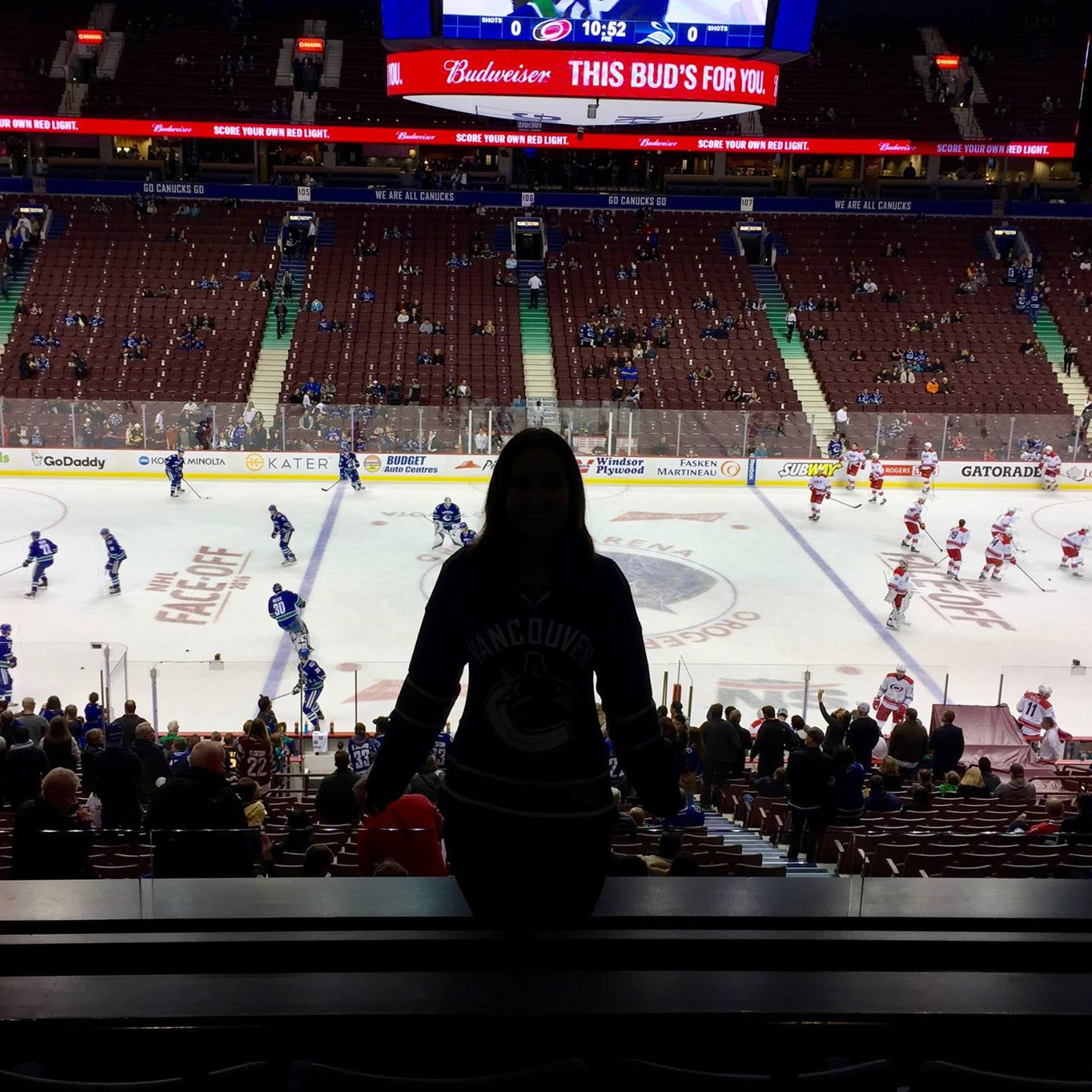 Evelyn Martin hosting the Budweiser corporate stadium suite at a Vancouver Canucks game. 