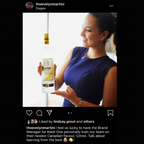 Woman holding a bottle of Ketel One with a Diageo logo in the corner