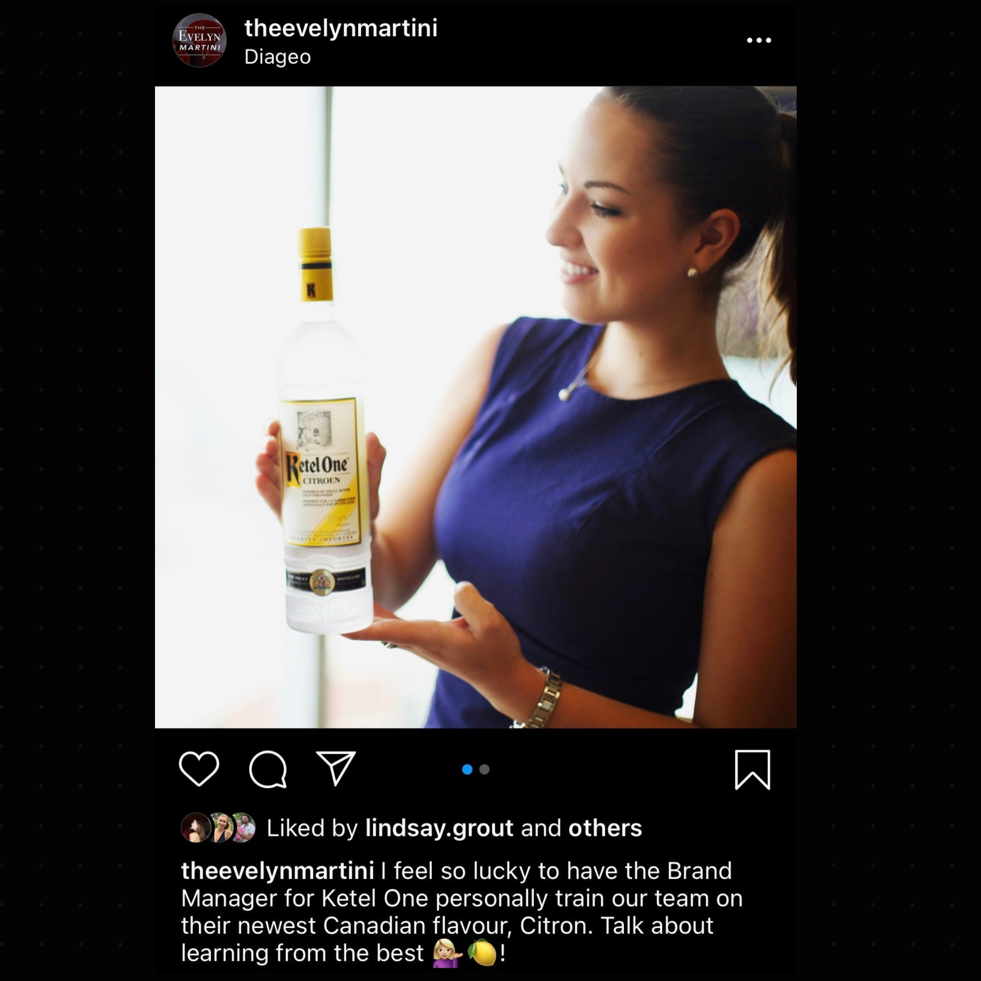 Woman holding a bottle of Ketel One with a Diageo logo in the corner